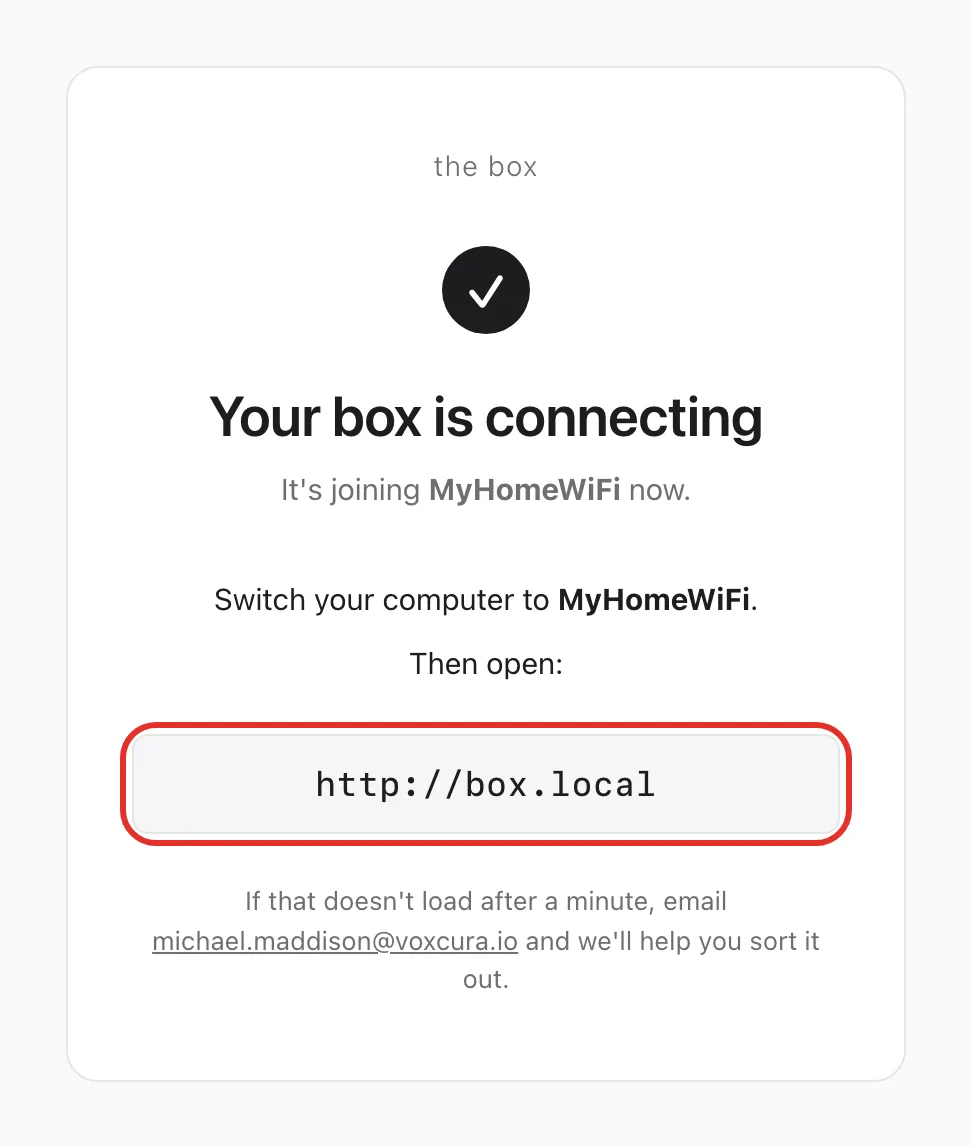 The Your box is connecting page; the http://box.local address is circled