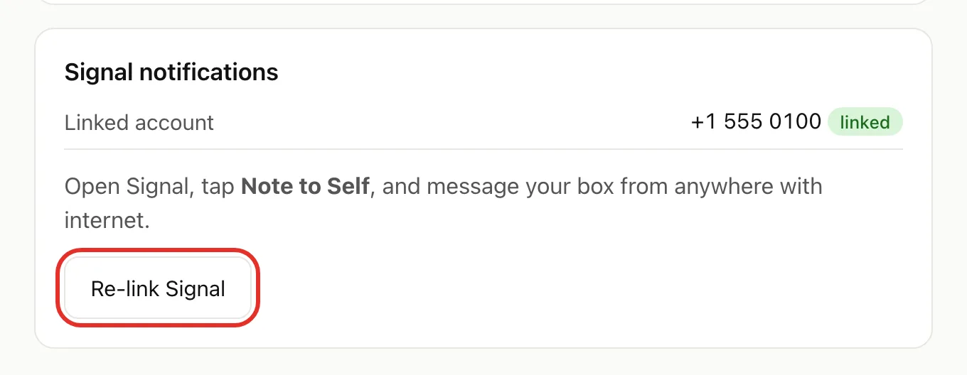 The Signal notifications card showing a linked account, with the Re-link Signal button circled