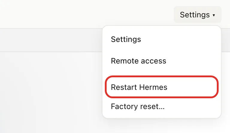 The Settings menu open on the chat screen, with Restart Hermes circled